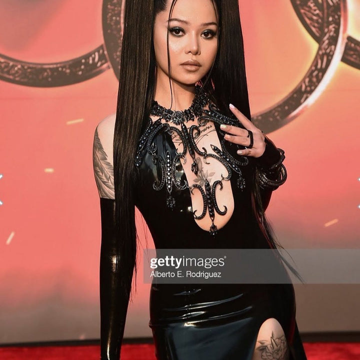 A custom full latex look worn on the red carpet. Styling by Nothing But Trouble.