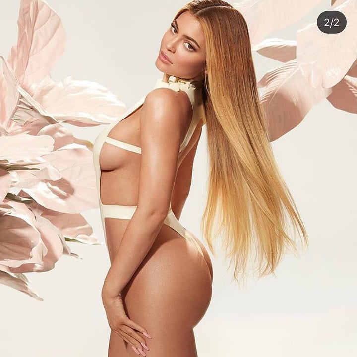 High Neck Bodysuit in white, shot for the campaign and run on a billboard in Los Angeles. Photograph by Greg Swales.