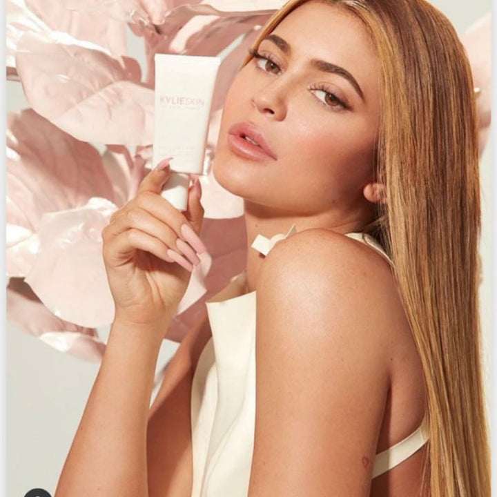 High Neck Tie Suit in white, worn for the Kylie Skin campaign.