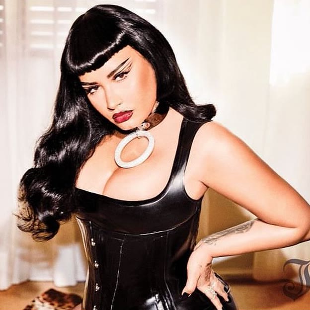 Princess Bodysuit worn by Demi Lovato. Photograph by Ellen von Unwerth, styling by Dianne Garcia.