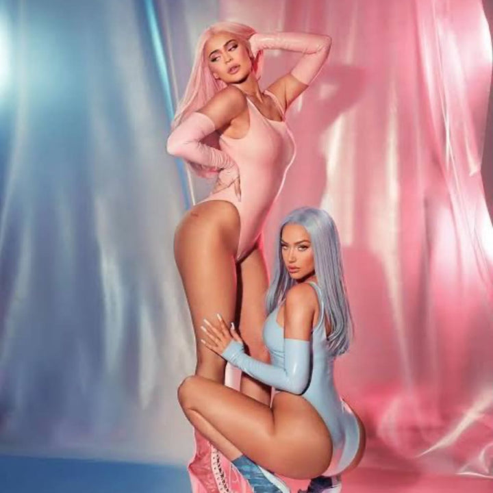 Tank Bodysuits and Fingerless Opera Gloves in baby blue and baby pink. Photograph by Greg Swales.