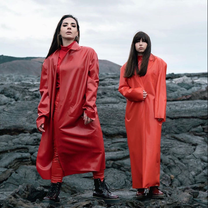 Custom red and transparent red trench coats, shot in Iceland. Styling by Star Burleigh, photograph by Graziano Piazza.