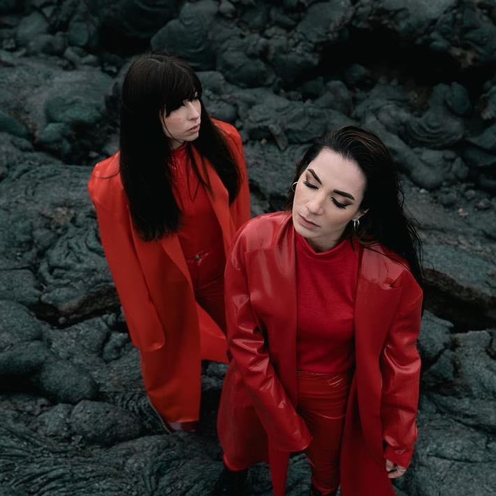 Custom red and transparent red trench coats, shot in Iceland. Styling by Star Burleigh.
